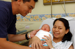 New Family <br />
by U.S. Navy photo in the public domain, via wikimedia commons New Family <br />
by U.S. Navy photo in the public domain, via wikimedia commons