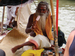 A Guru eating a Strawberry Ice Cream