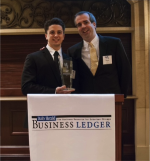 Midwest Fit Club Co-Founders Shane Herman and Steve Arch pose after receiving the Annual Awards for Business Excellence by The Daily Herald Business Ledger Midwest Fit Club Co-Founders Shane Herman and Steve Arch pose after receiving the Annual Awards for Business Excellence by The Daily Herald Business Ledger