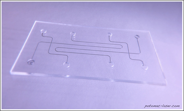 PMMA Microfluidic Chip with features as small as 50 microns. Potomac Photonics.