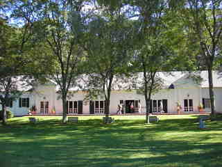 Music and nature are one at Music Mountain, located in Falls Village, Connecticut. Photo of Gordon Hall and the front lawn.