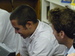 Joe works one on one with his students.