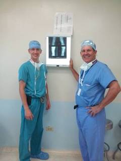 Dr. Martin and Lance reviewing x-rays. Dr. Martin and Lance reviewing x-rays.