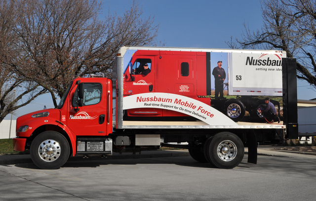 The brightly branded truck captures attention on the road and on customer drop-lots across the mid-west.