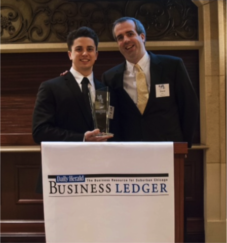 Midwest Fit Club Co-Founders Shane Herman and Steve Arch pose after receiving the Annual Awards for Business Excellence by The Daily Herald Business Ledger