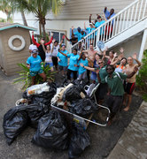 A happy Grand Cayman group taking stock of the trash they cleaned up and the good they have done on Earth Day.