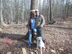 Storrs land owners and Adventure Park partners, Lynn and Chris Kueffner with their Labrador, "Rusty" at the Adventure Park site during construction. (Photo by Anthony Wellman)