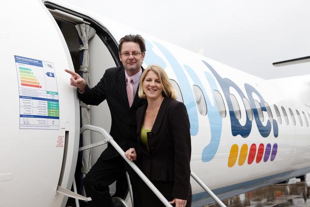 RIAS Managing Director Janet Connor and Flybe Regional Sales Manager Ken Harrower board a flight from Belfast City Airport: