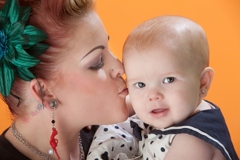 Baby with pierced ear