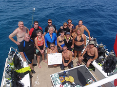 Apollo 11 Astronaut Buzz Aldrin with the staff of Divetech Grand Cayman