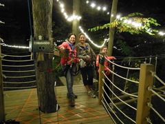 Three climbers pause for a photo before embarking into the night at one of The Adventure Parks of The Outdoor Venture Group.