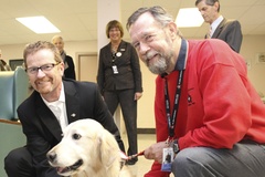 Minister of Health, Terry Lake, Bonnie and Adrian Renkers share their heart for promoting excellent senior care through therapies, such as visits from Dog Therapy teams