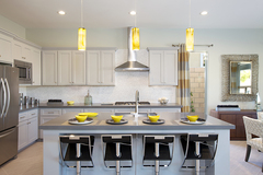 The new homes in Palm Desert feature beautiful open and modern kitchens.