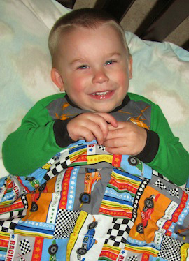 Xavier Holds His Project Linus Blanket