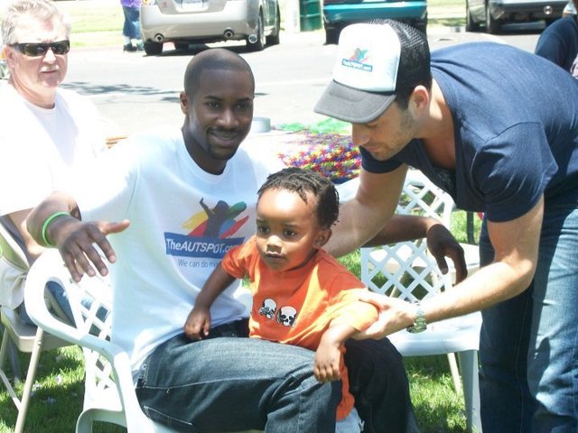 Dele Popoola (left) and Greg Koltsov (right) are the founders of TheAUTSPOTfoundation. The Brooklawn Gala will be raising money to help Tafari (middle) receive speech and behavior thearpy.