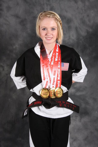 Paige Oswald With Three World Title Gold Medals