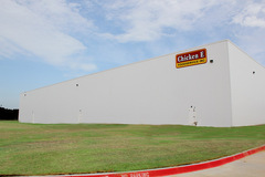 Insulated Metal Panels comprise the fourth wall of the Chicken Express Cold Storage Warehouse / Distribution Center in Burleson, Texas