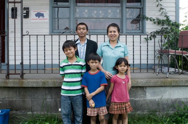 Nickel City Smiler - Family Photo - Forced to flee their homeland because of the brutal Burmese military dictatorship, Nickel City Smiler follows a refugee's struggle for hope & the American dream.