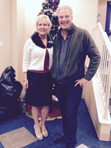 Vacuum Authority owner Russell Gay with Cathy Dykstra, President of the Family Scholar House.