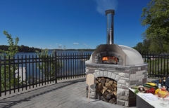 Pizza oven on the deck overlooking Lake Rosseau at JW Marriott The Rosseau Muskoka in Muskoka, Ontario, Canada.