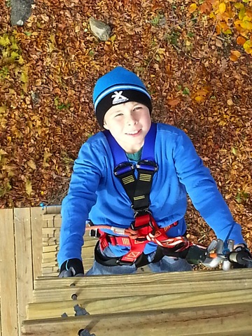 Climbing up to autumn adventure. This young climber is on his way to exploring the aerial trails at The Adventure Park. (Photo: Outdoor Ventures)