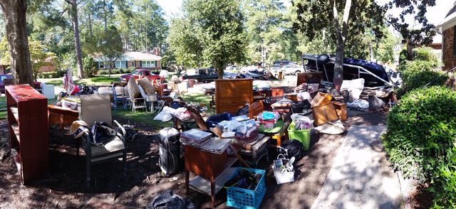 Floods destroyed homes across the Midlands of South Carolina on Oct. 4, 2015. Families on Burwell St. in Columbia, S.C., gathered to empty houses that had flooded to the rooftops. Photo: Scott Nuelken