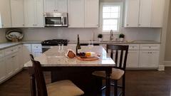 A newly renovated kitchen makes this flipped property a must-have for any homebuyer.