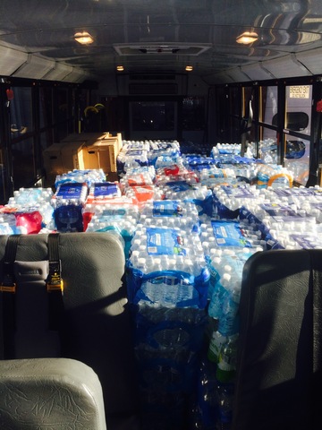 First Student buses have delivered more than 10,000 bottle of clean water to Flint. 