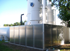 A 14-panel Acoustiblok Hurricane All Weather Sound Panel assembly was placed around the exhaust blower site.