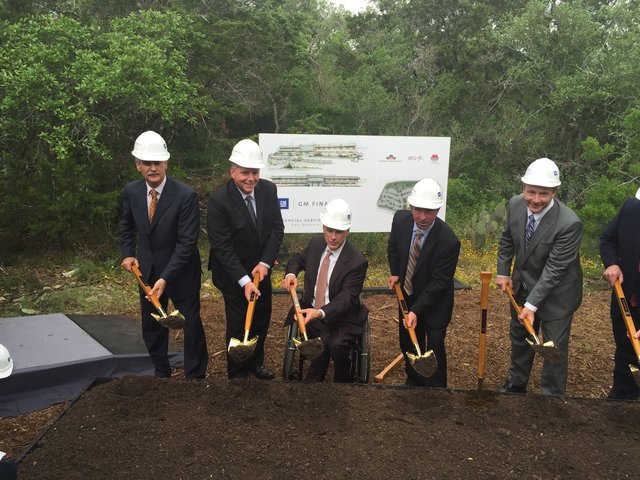 Governor Greg Abbott and other dignitaries break ground at the GM Financial Service Center, to be constructed by Bob Moore Construction