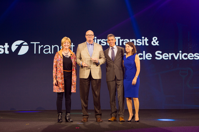 First Transit's Todd Hawkins, second from left, accepts the 2016 Infor Excellence in Action Award in New York, New York, Monday, July 11, 2016.  (Photo: John McGall via Infor)