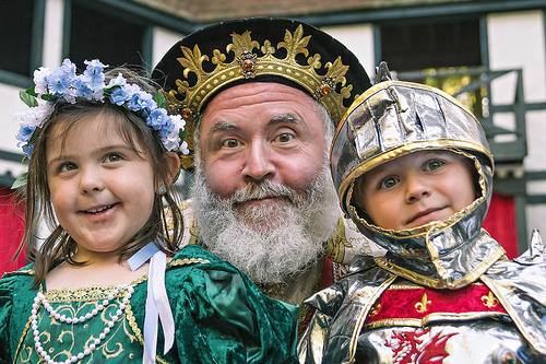 King Richard praises a pair of Prince and Princess Promenade participants