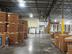 The warehouse at Lastique is full of various machinery and polymers ready to be melted down and tested, recycled, or packaged and shipped out to clients through the loading bay 