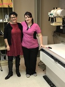 Ashley Milburn (right) and Dr. Stacie Grossfeld stand in the Orthopaedic Specialists office. Dr. Grossfeld is excited to offer treatment to Spanish speakers in the Louisville area thanks to Ashley.