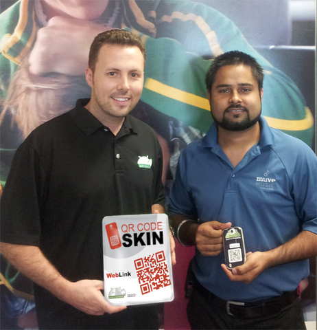 Rob Moser & Inder Singh Holding Ipad and Android Phone With QR Code Skin