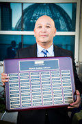 Judge F. Dino Inumerable '94 with Alumni Judicial Officers plaque