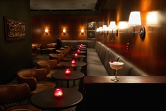 Mr. Lee's, located at 395 Goss Avenue, features a red leather bar and comfortably cozy seating arrangements throughout the cocktail lounge.