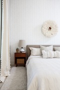 White may seem boring, but different shades and depths of the color can add a subtle complexity to a room like this bedroom designed by Bethany Adams - Certified Interior Designer in Louisville, KY. 