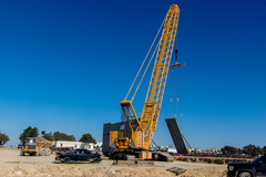 This is the largest crane of its kind in north Texas. The crane is performing tilt-up construction at General Motors' Automotive Logistics Center in Arlington Texas by Bob Moore Construction. 