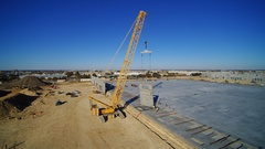 This is the largest crane of its kind in north Texas. The crane is performing tilt-up construction at General Motors' Automotive Logistics Center in Arlington Texas by Bob Moore Construction. 