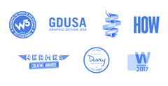 Logos for various awards won by Plaudit Design.