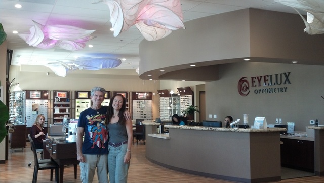 LightSculpture artists, William Leslie and Alessandra Colfi, at their latest installation at EyeLux Optometry in 4S Ranch.