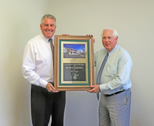 President Ed McGuire (left) and Executive Vice President Larry Knox (right) displaying the 2017 OCA Award