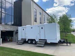 The 24' Urban Restroom Trailer features seven stalls split among men and women, running water sinks, flushable toilets, wood grain floors, and offers unbeatable comfort and class.