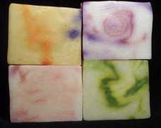 These soap bars are Life's a Beach, Patchouli, Candy Cane and Green Apple.