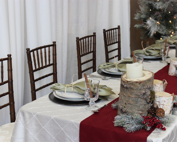 Festive holiday table setting from Special Event Rentals. The best in holiday party planning and rentals. 