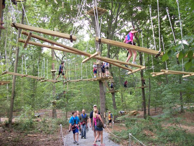 Kids, teens and adults enjoy the different challenge levels offered at The Adventure Park at The Discovery Museum in Bridgeport, Connecticut. (Photo by Anthony Wellman)